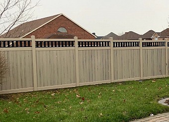 Hazelwood, privacy fence with Black vinyl picket top